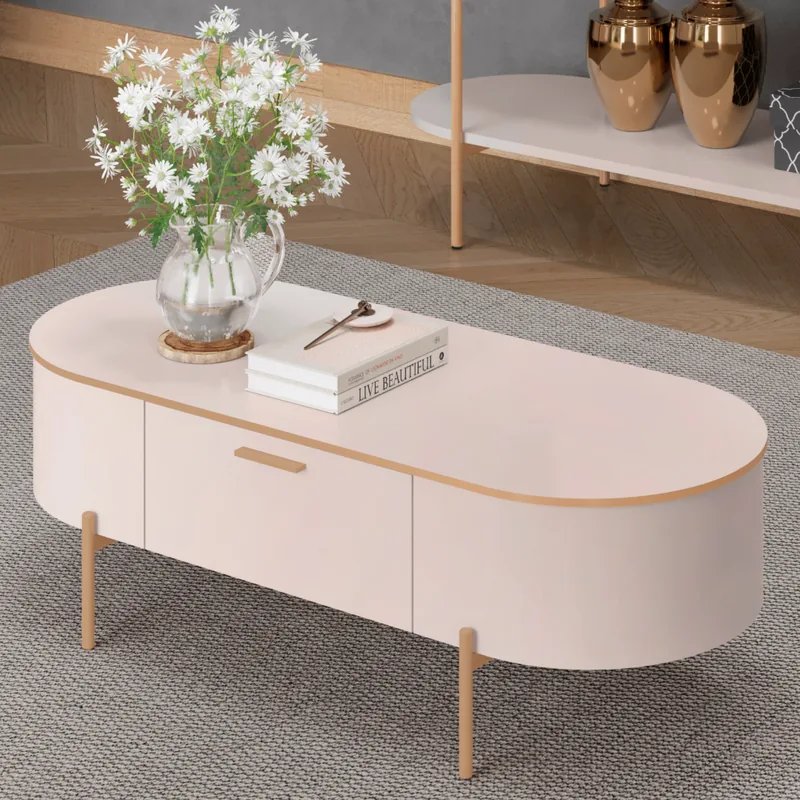 Detalle de la gaveta frontal y las patas metálicas doradas de la mesa Celena