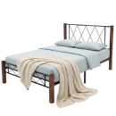 Cama matrimonial con respaldo de metal
